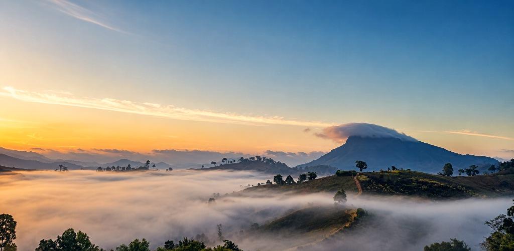 Sea of mist over mountain ridges and summit at Ban Na On, Pang Mapha at dawn