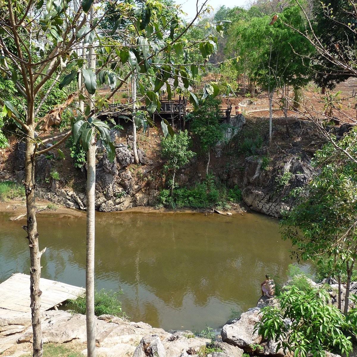 Water and weir above the village road